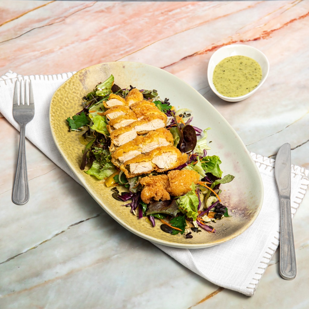 Gebackenes Hühnerschnitzel mit glutenfreier Kartoffelpanade